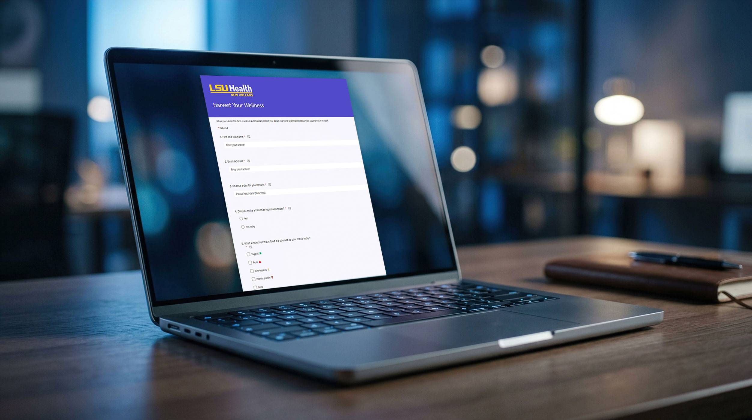 Notebook with the display showing the online challenge form